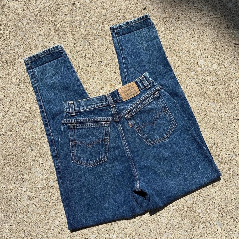 Vintage high waisted dark stone wash slim fit tapered leg Levi’s jeans